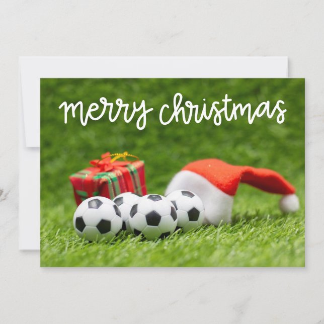 Soccer ball on green grass for Christmas Holiday   Card (Front)