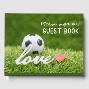 Soccer ball on green grass guest book