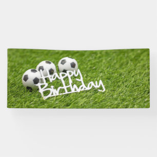 Soccer ball with Happy Birthday word on green Banner