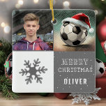 Soccer Ball with Santa Hat Snowflake Photo Ceramic Ornament<br><div class="desc">Soccer Ball with Santa Hat Snowflake Photo Ceramic Ornament. Grey and white background with a fun soccer ball with red Santa hat. This Christmas ornament is a perfect gift for kids and teens. Custom photo, snowflake, and a ball with Santa hat, will add a playful and joyful touch, while the...</div>