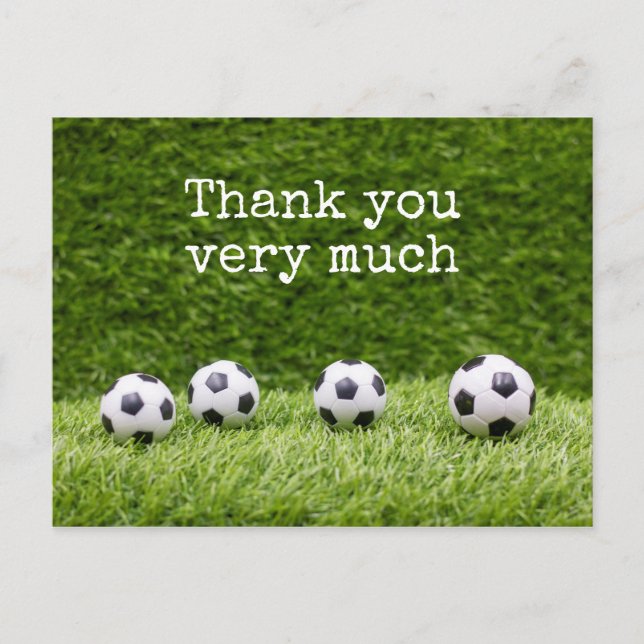 Soccer ball with word Thank you on green grass Postcard (Front)