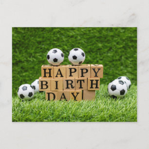 Soccer Birthday card with balls on green grass 