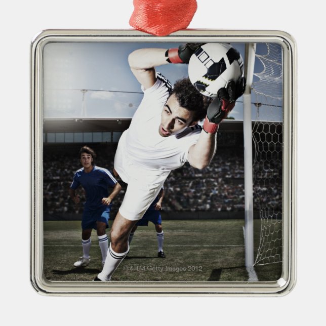 Soccer goalie catching soccer ball metal ornament (Front)