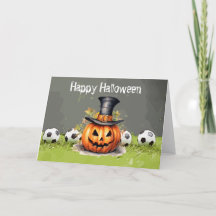 Soccer Happy Halloween with balls on green grass 
