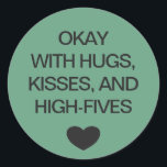Social distancing colour code green wedding classic round sticker<br><div class="desc">Social distancing colour-coded green sticker to help you and your wedding guests feel safe and comfortable with your social interactions and let others know what level of social distancing you are comfortable with. The customisable text reads "OKAY WITH HUGS, KISSES, AND HIGH-FIVES". Matching items and instruction signs are available in...</div>