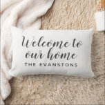 Soft Black Script Welcome to Our Home Lumbar Cushion<br><div class="desc">Rich soft black paired with ivory script creates a refined,  contemporary look on this personalised indoor lumbar pillow featuring Welcome to Our Home and your family name. The tonal warmth of the ivory lettering against the deep background adds understated elegance to any living space. All text is fully editable.</div>