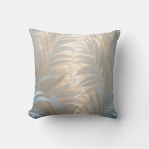 Soft gold of white tropics, pastel palm leaves cushion