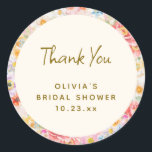 Soft Pastel Watercolor Floral Bridal Shower Classic Round Sticker<br><div class="desc">This bridal shower sticker features a lush watercolor floral border in soft pastel pink, peach, lavender, and blush blooms surrounding a cream center with "Thank You" in an elegant handwritten script. The bride's name, event, and date make it a personal, coordinated finishing touch for favors, gift bags, or envelope seals....</div>