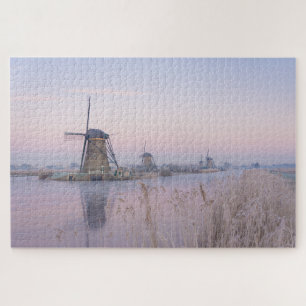 Soft sunrise light in winter over windmills jigsaw puzzle