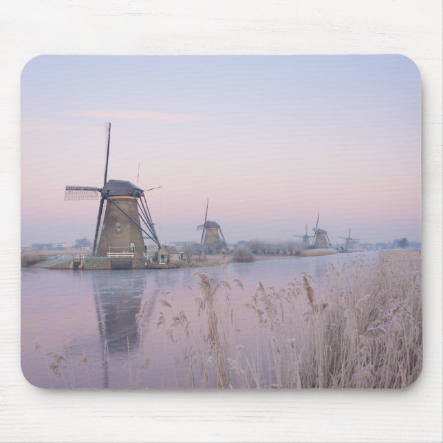 Soft sunrise light in winter over windmills mouse pad (Front)
