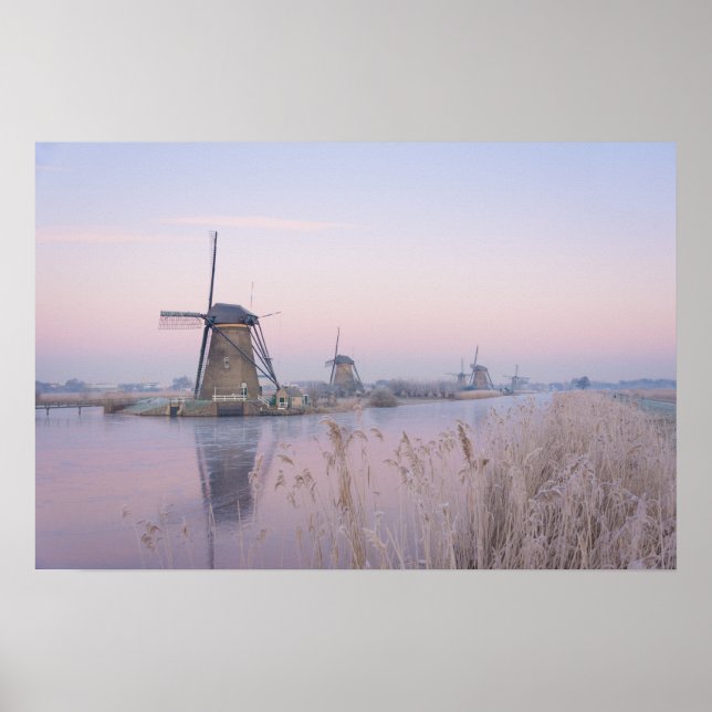 Soft sunrise light in winter over windmills poster (Front)