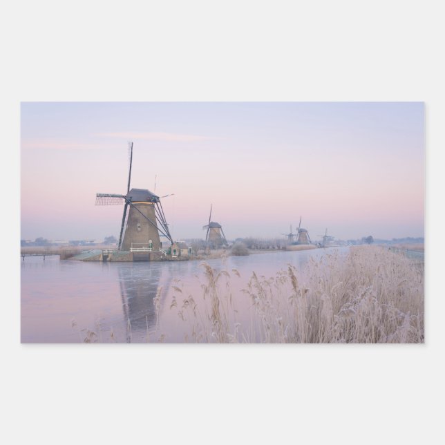 Soft sunrise light in winter over windmills rectangular sticker (Front)