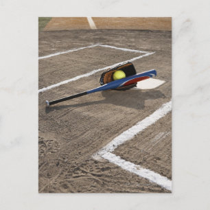 Softball, softball glove and bat at home plate postcard