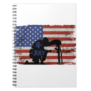 Soldier kneeling silhouette and American flag Notebook