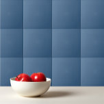 Solid blue ceramic tile<br><div class="desc">Solid color steel blue design.</div>