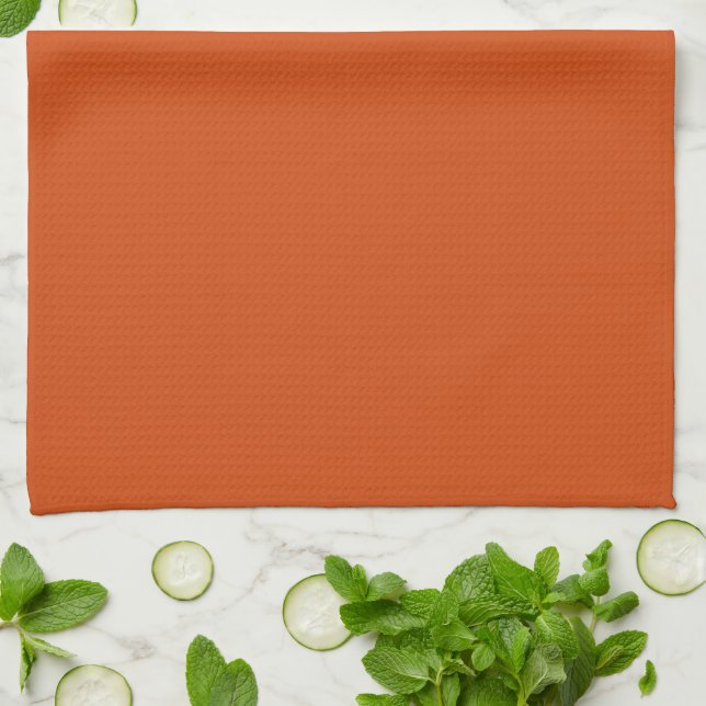 Solid colour plain rusty burnt orange tea towel (Folded)