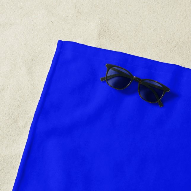 Solid colour plain sapphire bright blue beach towel (In Situ)