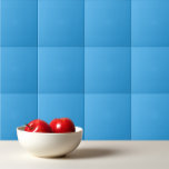 Solid curious bright blue ceramic tile<br><div class="desc">Solid curious bright blue design.</div>