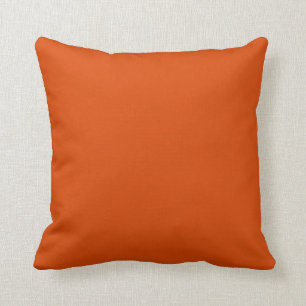 Solid dark burnt orange cushion