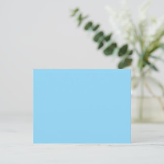 Solid light blue background evenly coloured postcard