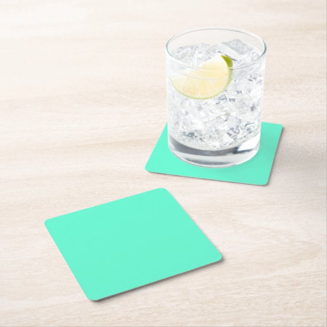 Solid neon mint cyan green square paper coaster (Insitu)
