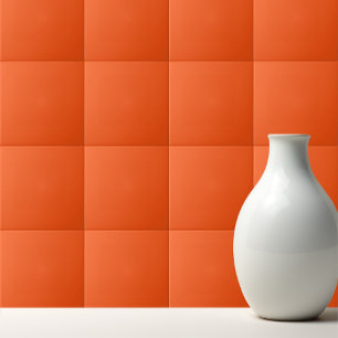 Solid neon orange ceramic tile