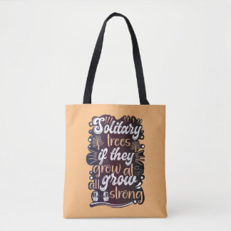 Solitary trees, if they grow at all, grow strong tote bag
