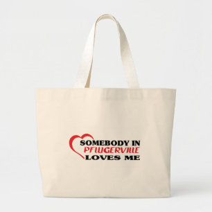 Somebody in Pflugerville loves me t shirt Large Tote Bag
