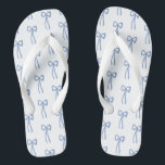 Something Blue Coquette Bow Bridal Thongs<br><div class="desc">A perfect little something blue for getting ready on your wedding weekend or for your honeymoon! These darling coquette bows would make a great bridesmaids gift for your girls, as well. Add some prep to your step and toss these darling flip flops in your beach or pool bag this summer!...</div>