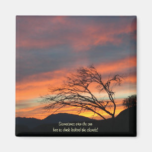Sometimes even the Sun has to duck behind Clouds! Magnet