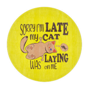 Sorry I am late my cat was laying on me Cutting Board