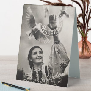 Soviet holiday card with a girl and birds