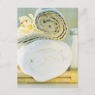 Spa towels and tropical flower postcard