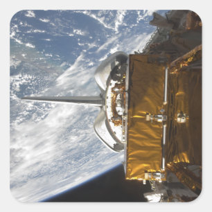 Space Shuttle Atlantis' payload bay backdropped Square Sticker