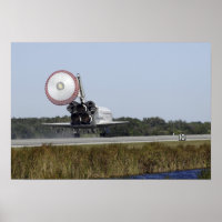 Space shuttle Atlantis unfurls its drag chute 2