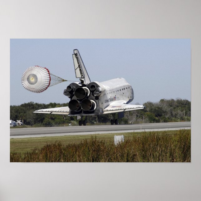 Space shuttle Atlantis unfurls its drag chute Poster (Front)