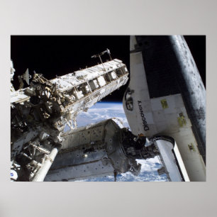 Space Shuttle Discovery docked with ISS (STS-114) Poster