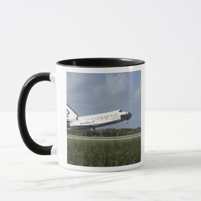 Space shuttle Discovery lands on Runway 33 Mug (Left)