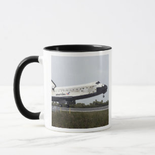 Space Shuttle Discovery touches down Mug