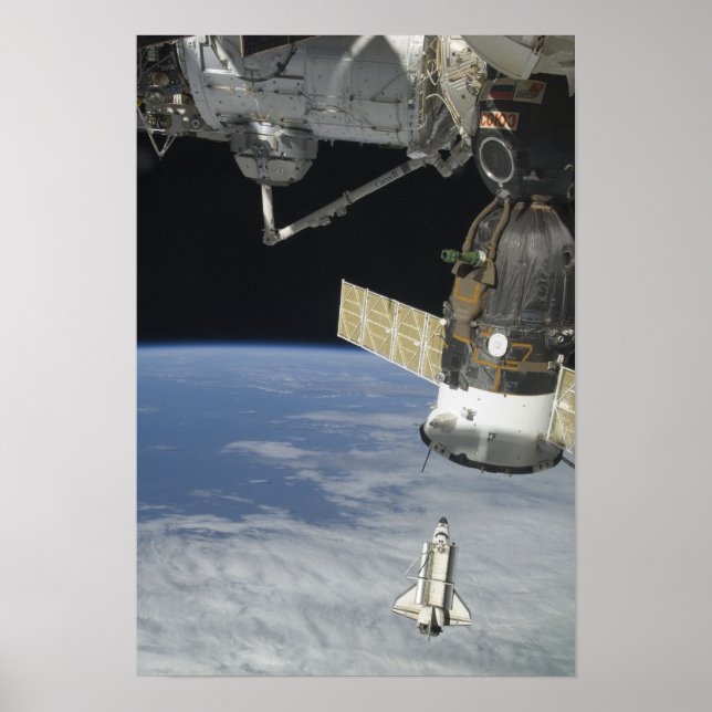 Space shuttle Endeavour, a Soyuz spacecraft Poster (Front)