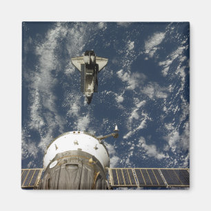 Space Shuttle Endeavour and a Soyuz spacecraft Magnet