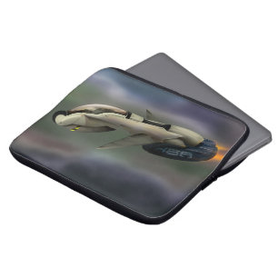 Spacecraft flying through a planet laptop sleeve