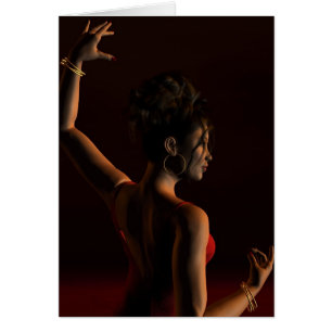 Spanish Flamenco Dancer on a Dark Stage