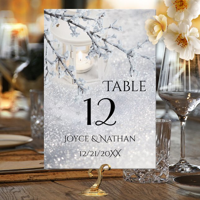 Sparkling Snow Winter Wedding Table Number Card (Table number card with a winter wonderland scene with a candle lit lantern in sparkling snow)