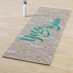 Sparkling water on beach sand yoga bum yoga mat