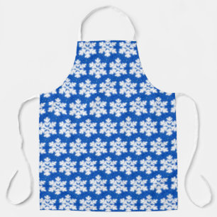 Sparkling white snowflakes blue background apron
