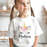 Sparkly Unicorn with Eyelashes Personalized Kids T-Shirt<br><div class="desc">Let your little one's imagination run wild with this adorable personalized unicorn t-shirt! Featuring a cute unicorn face with sparkling gold accents, a floral crown, and long eyelashes, this shirt is perfect for kids who love all things magical. Personalize it with your child's name to create a unique and special...</div>