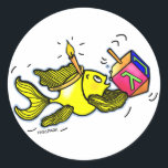 Sparky Hanuka Fish - Comic Cure Drawing Gift Classic Round Sticker<br><div class="desc">"Hanukkah Fish" is a gorgeous comic Gift. Sparky yellow fish is holding a dreidel and wearing a candle-like crown :) Its a perfect gift for a perfect Hanukkah. This gorgeous gift is featured in a range of matching gifts such as: Greeting Cards, Post Cards, US postage stamps, T-shirts, Tea/Coffee Mugs,...</div>