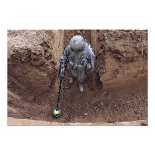 Specialist searches for a weapons cache photo print