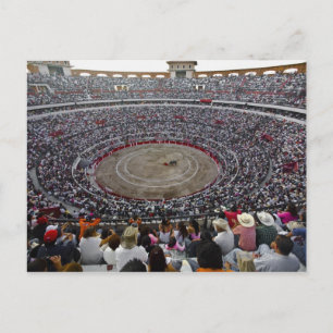 Spectators watching a bullfight in a bullring, postcard